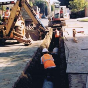 Construction of 18'' reinforced concrete pipe storm drain line in Saratoga, CA.